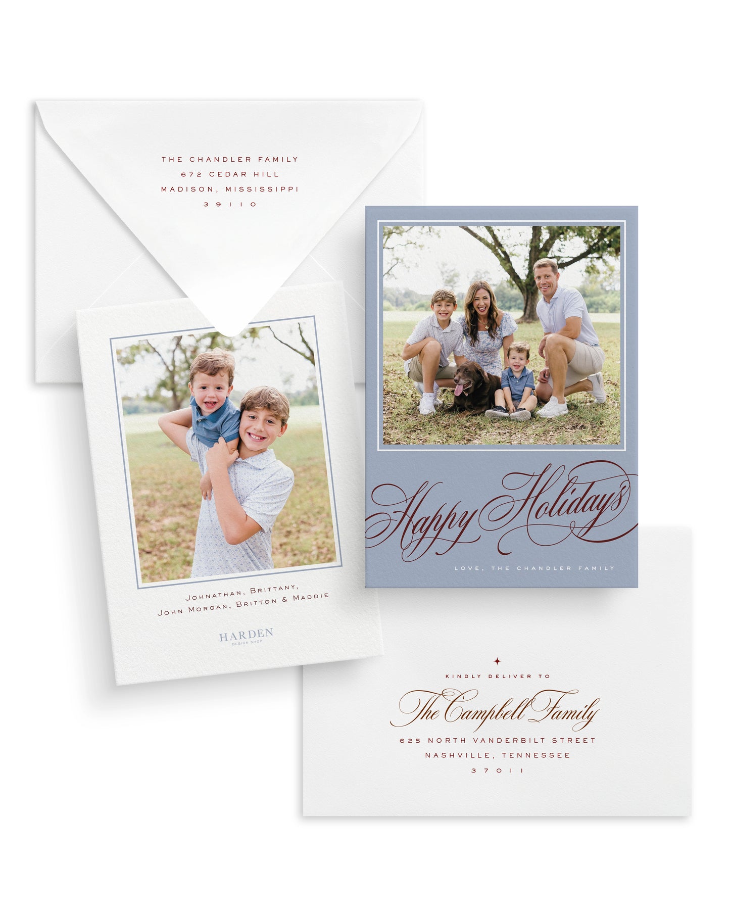 Holiday card with family photo and a labrador and 'Happy Holidays' text, featuring an envelope.