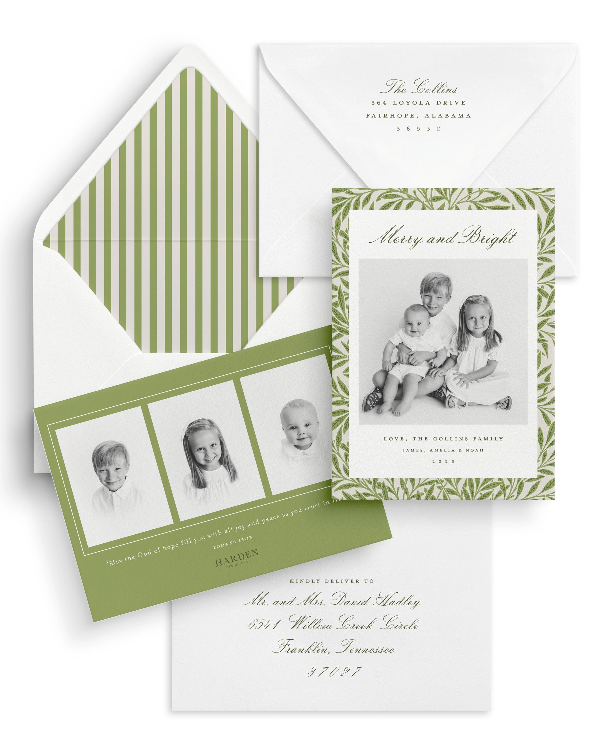 Christmas card with black and white photos of children and a green floral pattern and a striped envelope liner.